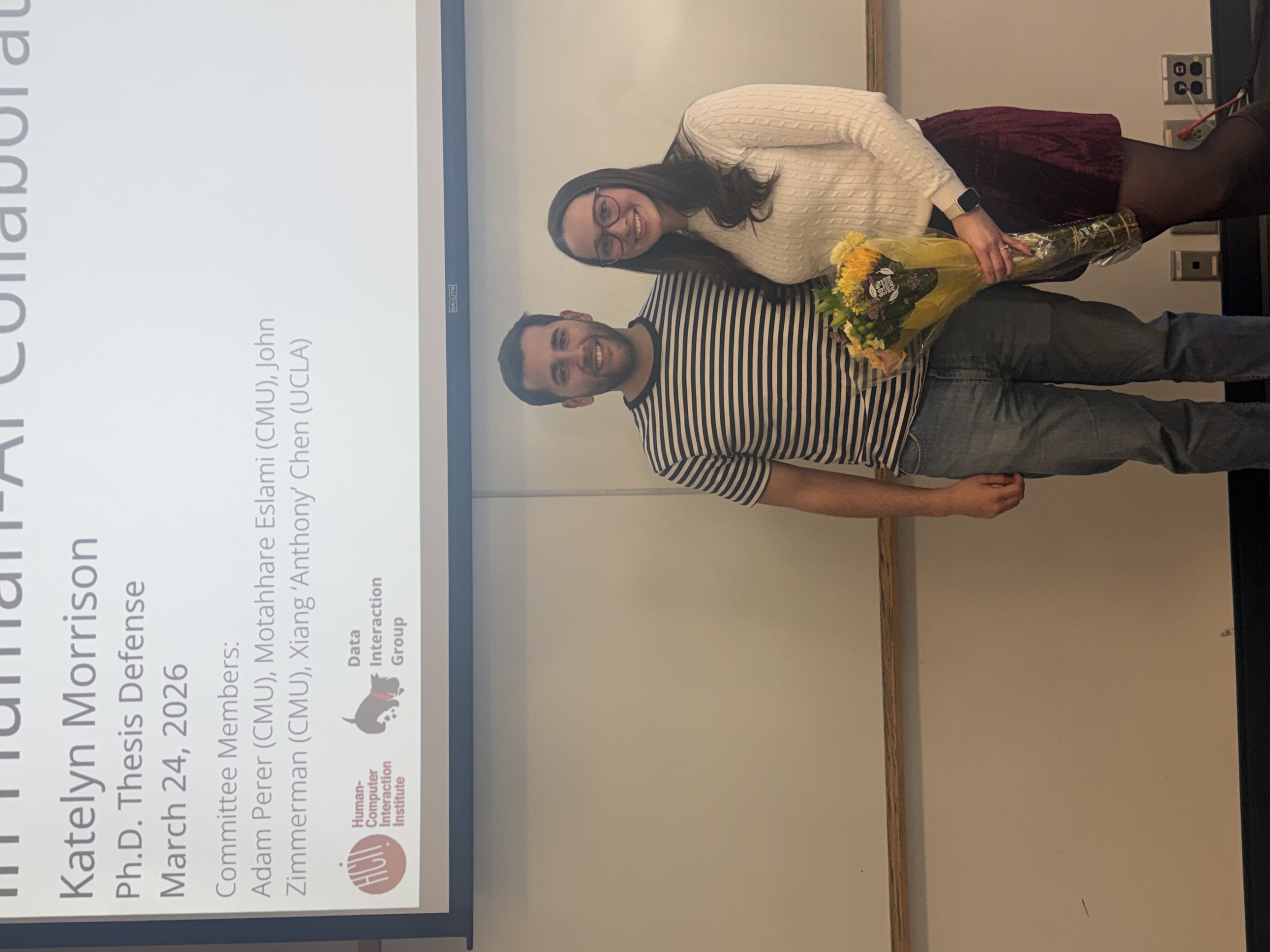 Katelyn and Alvaro celebrating Katelyn's PhD defense